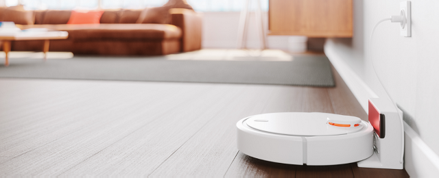 Robot Vacuum Cleaner in A Modern Living Room