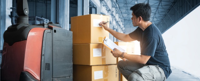 Asian Worker Holding Clipboard His Doing Inventory Management at Storage Warehouse