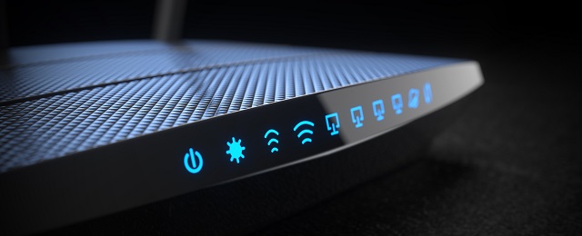 Wi-Fi wireless internet router on dark background