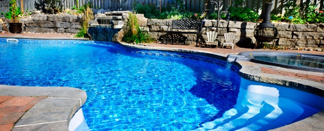 Swimming pool accented with a waterfall
