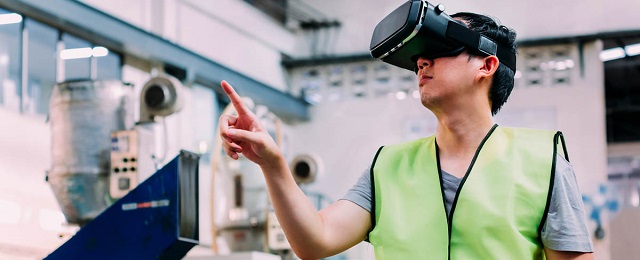 man using VR headset manufacturing