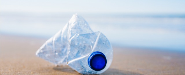 Plastic bottle at beach; 海塑